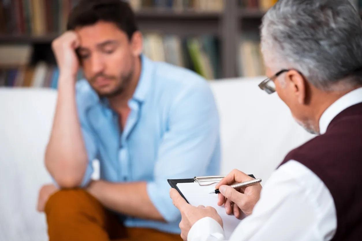 Psychologist on a video call with a young family in Point Cook for an NDIS counselling session.
